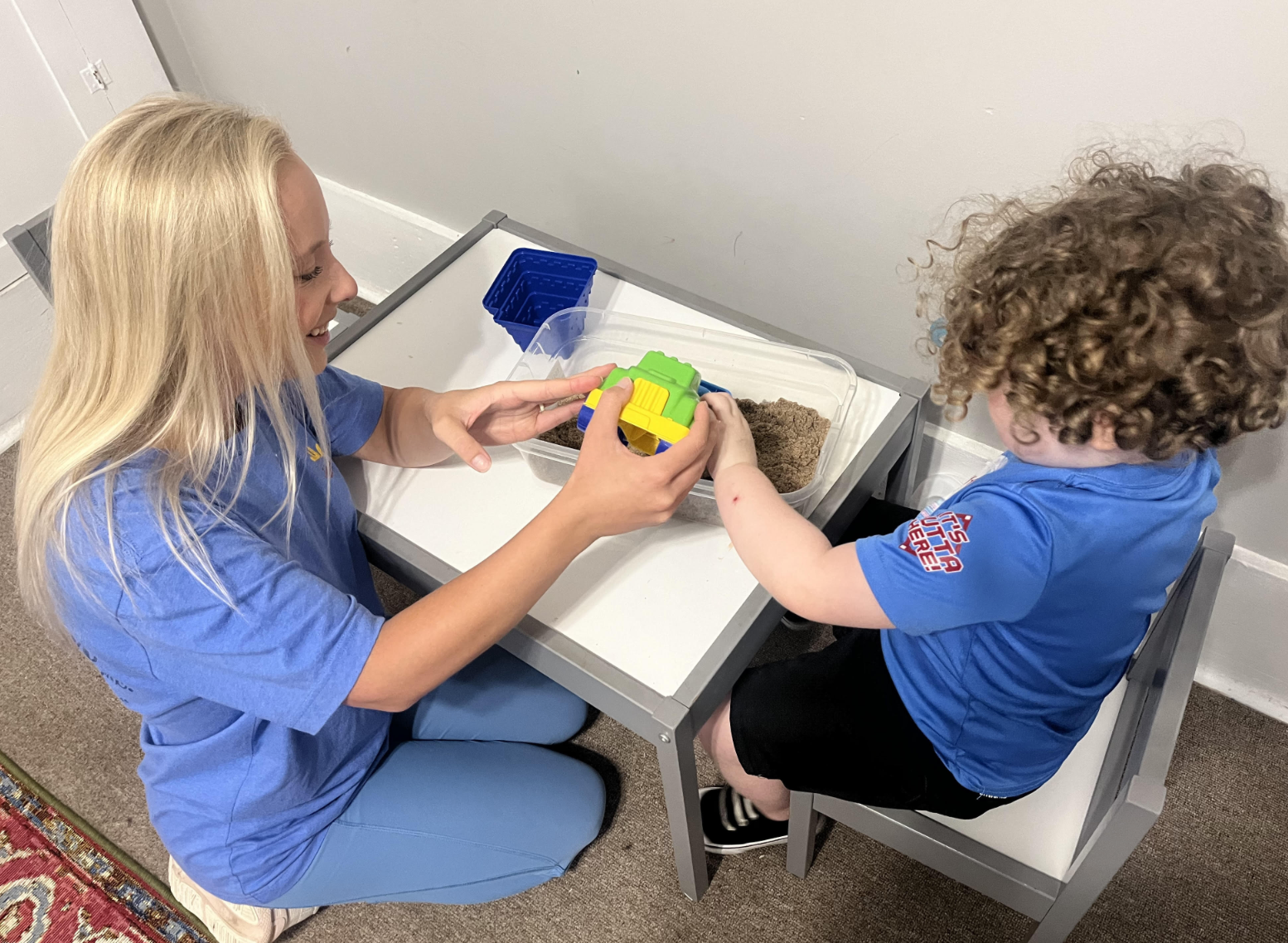 OT Speech Solutions, Inc. occupational therapist with a student